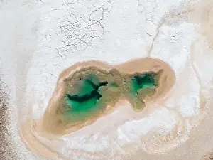 Alkaline Prints: Aerial view of the famous tourist attraction Ojos del Mar near Tolar Grande in the Argentinian highlands called Puna