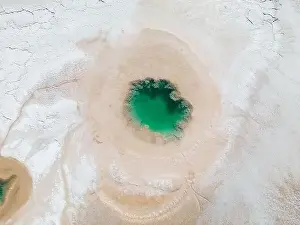 Alkaline Prints: Aerial view of the famous tourist attraction Ojos del Mar near Tolar Grande in the Argentinian highlands called Puna