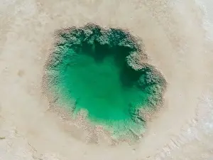 Alkaline Prints: Aerial view of the famous tourist attraction Ojos del Mar near Tolar Grande in the Argentinian highlands called Puna