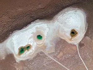 Alkaline Prints: Aerial view of the famous tourist attraction Ojos del Mar near Tolar Grande in the Argentinian highlands called Puna