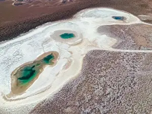 Alkaline Prints: Aerial view of the famous tourist attraction Ojos del Mar near Tolar Grande in the Argentinian highlands called Puna
