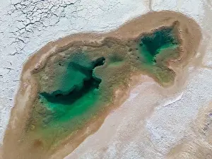 Alkaline Prints: Aerial view of the famous tourist attraction Ojos del Mar near Tolar Grande in the Argentinian highlands called Puna