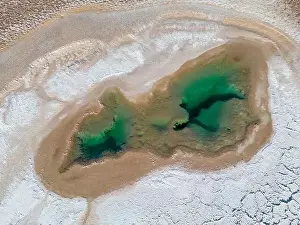 Aerial view of the famous tourist attraction Ojos del Mar near Tolar Grande in the Argentinian highlands called Puna in
