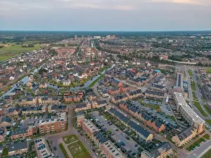 City Street Prints: Aerial view of the Fathorst residential area in Amersfoort in the Netherlands with evening sky