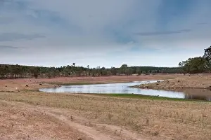 Aerial view of a fresh water reservoir in rural Australia which is reducing due to the extreme drought