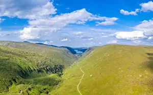 Lough Prints: Aerial view of the Glenveagh National Park with castle Castle and Loch in the background - County Donegal