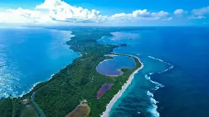 Pointe Prints: Aerial View to the Green Coast of the Pointe des Chateaux beach under the blue cloudy sky