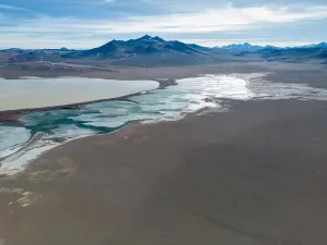 Green Lagoon Prints: Aerial view of the green and partly frozen Laguna del Negro Francisco in the Atacama desert in Chile - Traveling