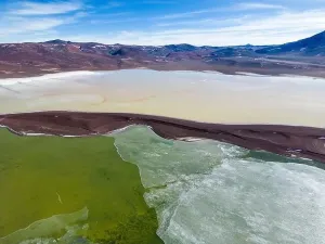 Green Lagoon Prints: Aerial view of the green and partly frozen Laguna del Negro Francisco in the Atacama desert in Chile - Traveling