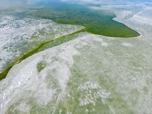 Off Road Prints: Aerial view of the green and partly frozen Laguna del Negro Francisco in the Atacama desert in Chile - Traveling