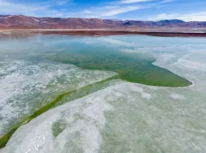 Off Road Prints: Aerial view of the green and partly frozen Laguna del Negro Francisco in the Atacama desert in Chile - Traveling