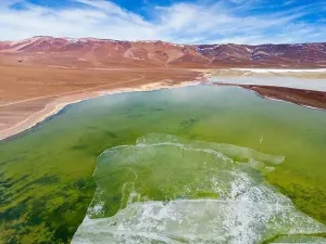 Vastness Prints: Aerial view of the green and partly frozen Laguna del Negro Francisco in the Atacama desert in Chile - Traveling