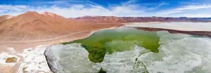 Off Road Prints: Aerial view of the green and partly frozen Laguna del Negro Francisco in the Atacama desert in Chile - Traveling