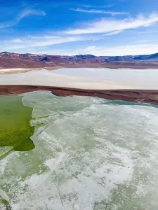 Off Road Prints: Aerial view of the green and partly frozen Laguna del Negro Francisco in the Atacama desert in Chile - Traveling