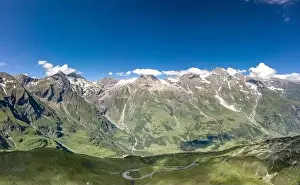Tirol Prints: Aerial view of Grossglockner mountain range with serpentine Taxenbacher Fusch high alpine road in Austria
