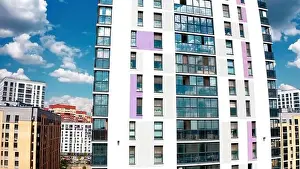Multi Storey Prints: Aerial view of a high residential building of a newly built city aeria