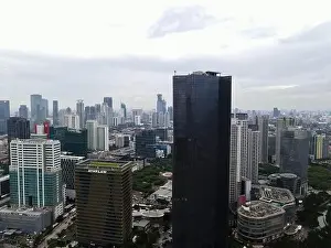Interchange Prints: Aerial view of highway intersection and buildings in the city of Jakarta and noise cloud with Jakarta cityscape