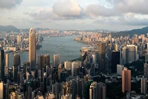 Images Dated 13th August 2017: Aerial view of Hong Kong skyline and Victoria Harbor with blue sky in Hong Kong. Asia