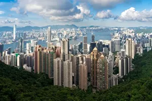 Hong Prints: Aerial view of Hong Kong skyline and Victoria Harbor with blue sky in Hong Kong