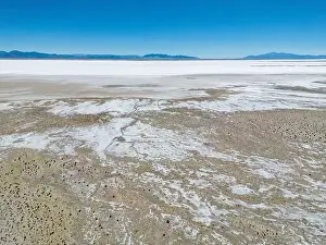 Aerial view of the huge salt flats Salinas Grandes de Jujuy in northern Argentina while traveling South America