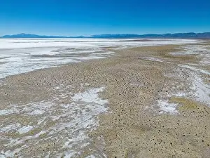 Aerial view of the huge salt flats Salinas Grandes de Jujuy in northern Argentina while traveling South America