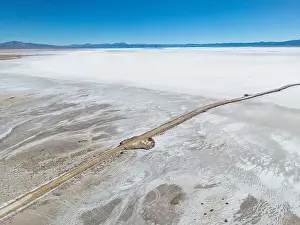 Vastness Prints: Aerial view of the huge salt flats Salinas Grandes de Jujuy in northern Argentina while traveling South America