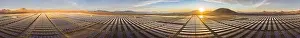Power Plant Prints: Aerial view of hundreds solar energy panels rows along the dry lands at Atacama Desert