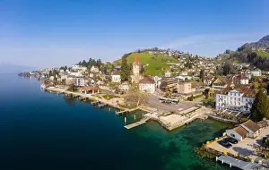 Lucerne Prints: Aerial view of the idyllic Weggis town by lake Lucerne in Central Switzerland on a sunny spring day