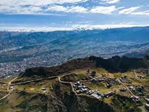 High Lying Prints: Aerial view from the impressive landmark Muela del Diablo over the mountains down into the valley with the cities La