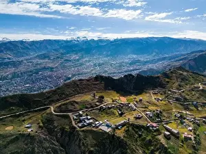 La Paz Prints: Aerial view from the impressive landmark Muela del Diablo over the mountains down into the valley with the cities La