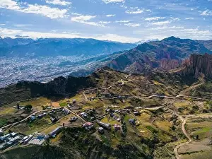 Aerial view from the impressive landmark Muela del Diablo over the mountains down into the valley with the cities La