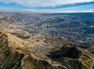 La Paz Prints: Aerial view from the impressive landmark Muela del Diablo over the mountains down into the valley with the cities La