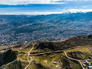 La Paz Prints: Aerial view from the impressive landmark Muela del Diablo over the mountains down into the valley with the cities La