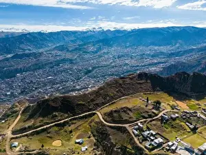 La Paz Prints: Aerial view from the impressive landmark Muela del Diablo over the mountains down into the valley with the cities La