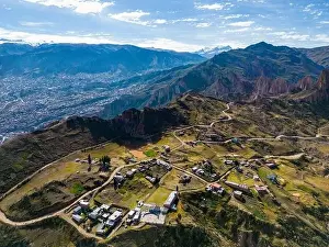 La Paz Prints: Aerial view from the impressive landmark Muela del Diablo over the mountains down into the valley with the cities La