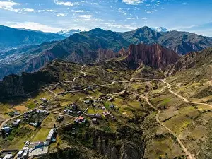 Aerial view from the impressive landmark Muela del Diablo over the mountains down into the valley with the cities La