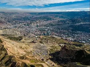 Overland Prints: Aerial view from the impressive landmark Muela del Diablo over the mountains down into the valley with the cities La