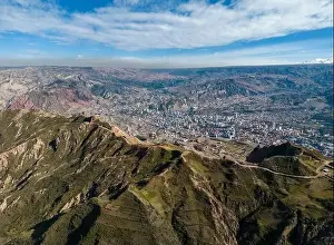 Overland Prints: Aerial view from the impressive landmark Muela del Diablo down into the valley with the highest capital
