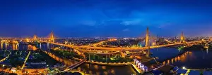 Bhumibol Prints: Aerial view of Industry Ring Suspending bridge at night in Bangkok, Thailand