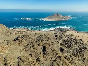 Pan De Azucar Prints: Aerial view of Isla Pan de Azúcar in the National Park Pan de Azúcar at the coast of the Atacama desert in Chile