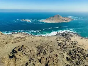 Pan De Azucar Prints: Aerial view of Isla Pan de Azúcar in the National Park Pan de Azúcar at the coast of the Atacama desert in Chile