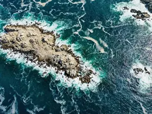 Greenish Prints: Aerial view of Isla Pan de Azúcar in the National Park Pan de Azúcar at the coast of the Atacama desert in Chile