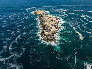 Greenish Prints: Aerial view of Isla Pan de Azúcar in the National Park Pan de Azúcar at the coast of the Atacama desert in Chile