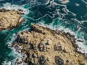 Greenish Prints: Aerial view of Isla Pan de Azúcar in the National Park Pan de Azúcar at the coast of the Atacama desert in Chile