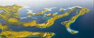 An aerial view of islands in Raja Ampat. This area is the heart of marine biodiversity and is a popular destination for scuba divers and snorkelers