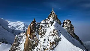 Chamonix Prints: Aerial view of jagged peaks pierce the sky