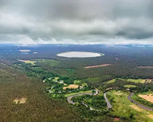 Aerial view of the lake and river in the forest. River Merkys and lake Glebo, Lithuania, Varena district