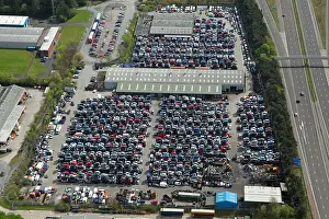 Scrap Prints: aerial view of a large car scrapyard next to the M58 at Skelmersdale, Lancashire