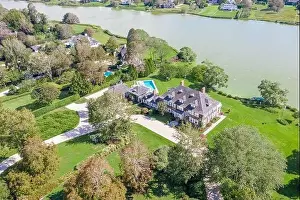 Aerial view of large Southampton estate on Agawan Lake in the estate section of Southampton, NY