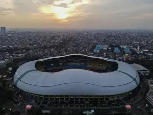 White Bridge Prints: Aerial View of The largest stadium of Bekasi from drone when sunset and noise cloud